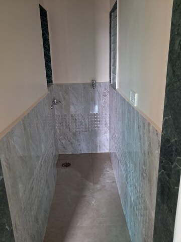 Bathroom in 2 BHK Apartment at Mohan Willows, Badlapur East – for Rent