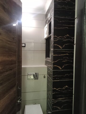 Bathroom in 3 BHK Builder Floor at Dwarka Mor – for Rent