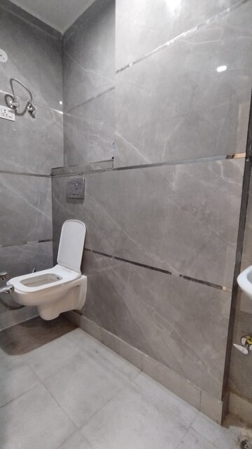 Bathroom in 3 BHK Builder Floor at Dwarka Mor – for Rent