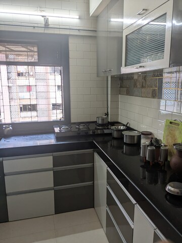 Kitchen in 2 BHK Apartment at Lokhandwala Breeze Apartments, Andheri West – for Rent
