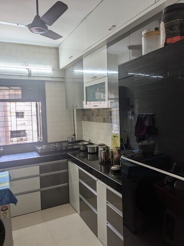 Kitchen in 2 BHK Apartment at Lokhandwala Breeze Apartments, Andheri West – for Rent