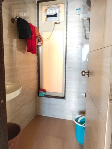 Bathroom in 1 BHK Apartment at Shyam CHS, Khanda Colony – for Rent