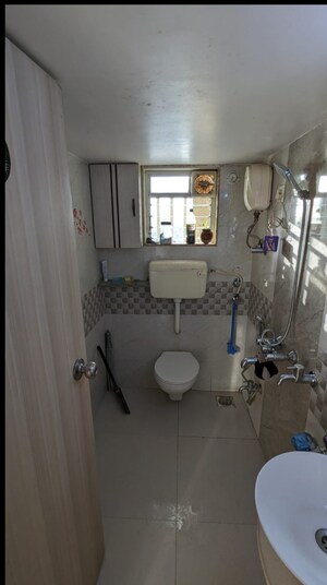 Bathroom in 2 BHK Apartment at Unique Aurum, Mira Road – for Sale