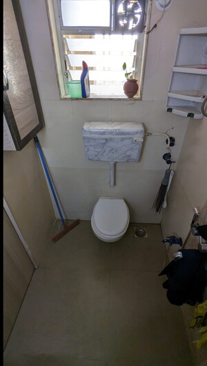 Bathroom in 2 BHK Apartment at Unique Aurum, Mira Road – for Sale