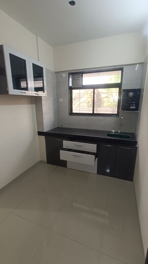 Kitchen in 1 BHK Apartment at Vinay Gardens Sapahale, Saphale – for Sale