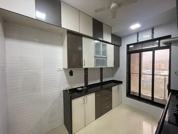 Kitchen in 2 BHK Apartment at Sheth Auris Serenity Tower 2, Malad West – for Sale