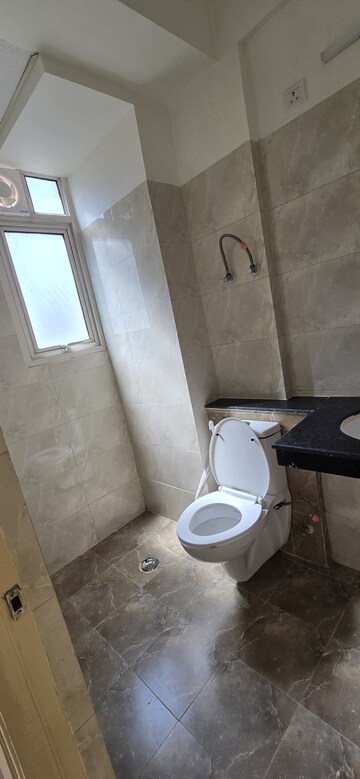 Bathroom in 2 BHK Apartment at Wave Executive Floors, Wave City – for Rent