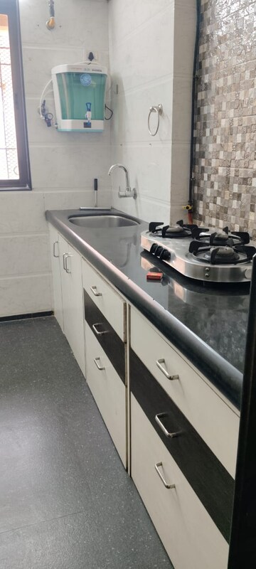 Kitchen in 3.5 BHK Apartment at Whispering Heights, Malad West – for Rent