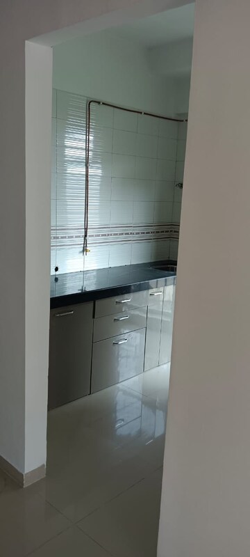 Kitchen in 2 BHK Apartment at Mahadev Complex, Mira Road – for Rent