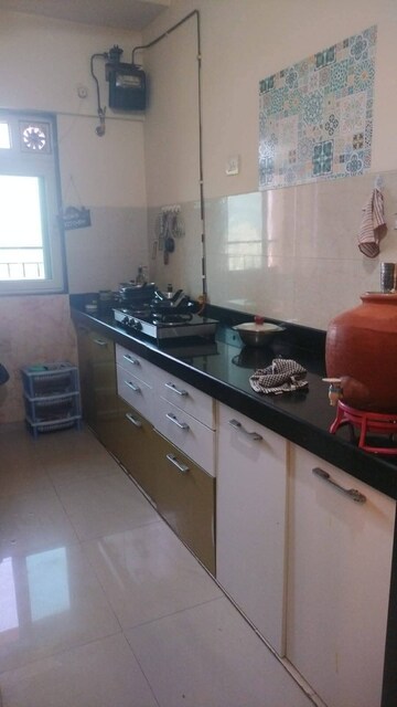 Kitchen in 2 BHK Apartment at Rustomjee Urbania Acura, Majiwada – for Rent
