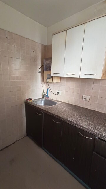 Kitchen in 2.5 BHK Apartment at Skytech Matrott, Sector 76 – for Sale