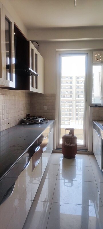 Kitchen in 3 BHK Apartment at BPTP Discovery Park, Sector 80 – for Rent