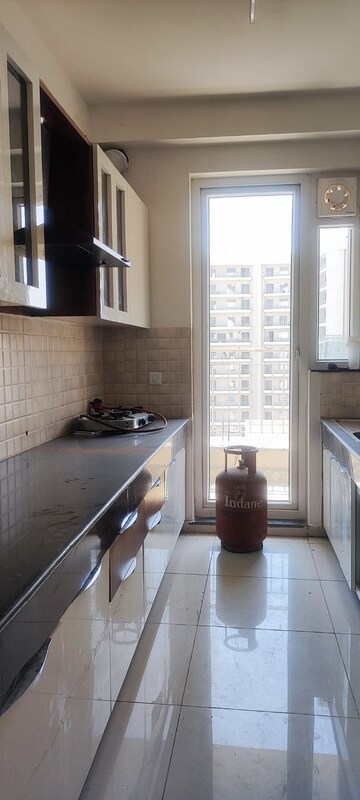 Kitchen in 3 BHK Apartment at BPTP Discovery Park, Sector 80 – for Rent