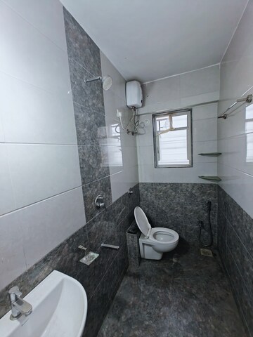 Bathroom in 2 BHK Apartment at Dagade White Woods, Bavdhan – for Rent