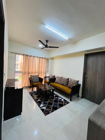 Living Room in 2 BHK Apartment at Lodha Palava Crown, Dombivli East – for Rent