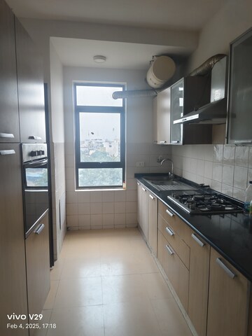 Kitchen in 2 BHK Apartment at Unitech Fresco, Sector 50 – for Sale