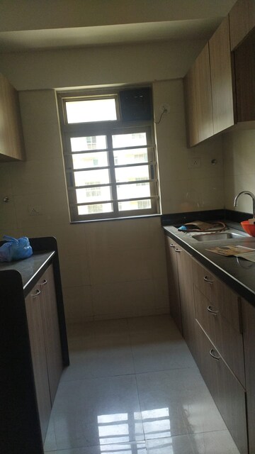 Kitchen in 2 BHK Apartment at Sheth Vasant Oasis, Andheri East – for Rent