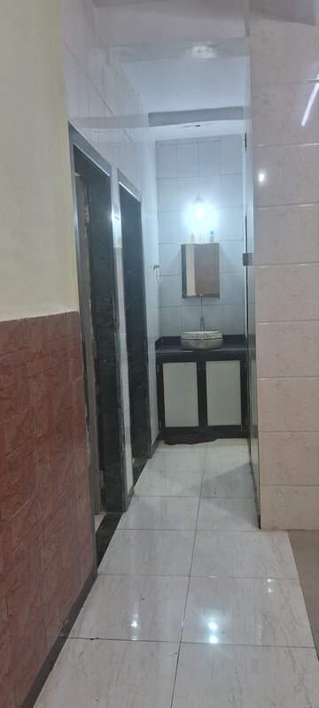 Kitchen in 2 BHK Apartment at Omkargiri Height, Kopar Khairane – for Rent