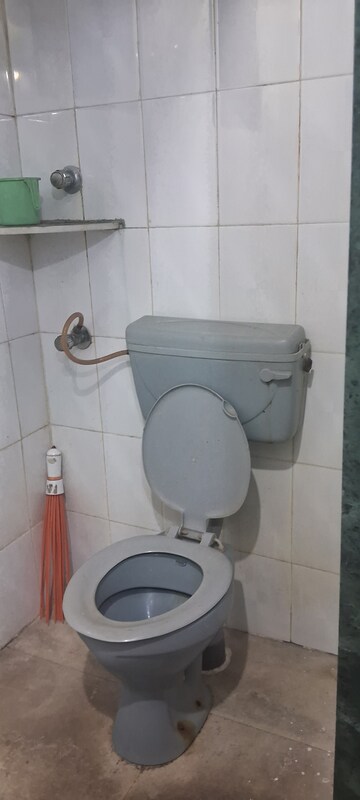 Bathroom in 2 BHK Apartment at Omkargiri Height, Kopar Khairane – for Rent