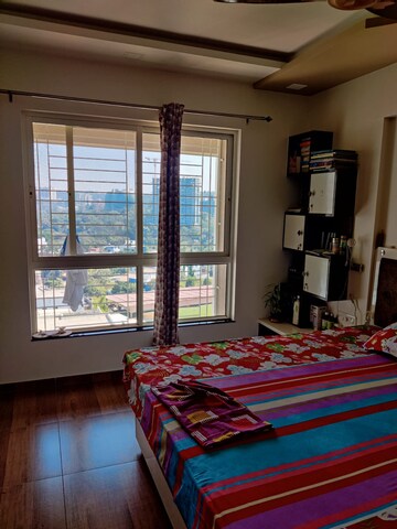 Bedroom in 2 BHK Apartment at Mont Vert Belbrook, Bhugaon – for Rent