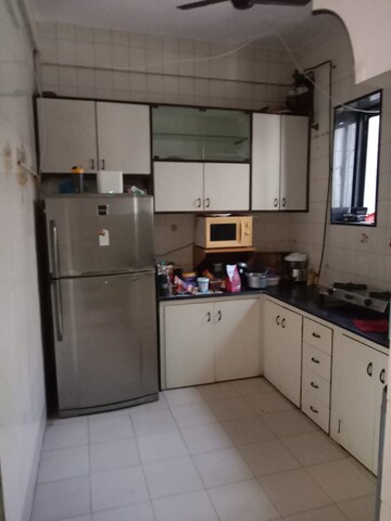 Kitchen in 1.5 BHK Apartment at Konkan Nagar CHS Mahim, Mahim West – for Rent