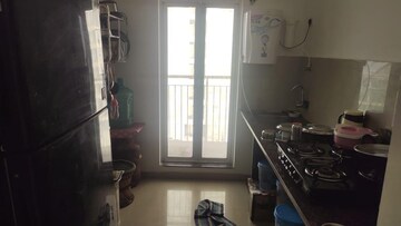 Kitchen in 2 BHK Apartment at Panchamrut Society – for Sale