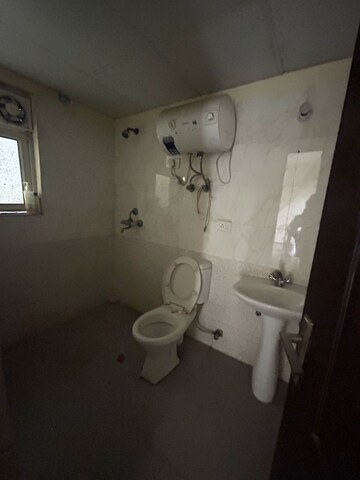 Bathroom in 3 BHK Apartment at Aims Golf City, Sector 75 – for Rent