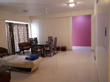 Living Room in 4 BHK Apartment at Adani Shantigram Water Lily, Shantigram – for Rent