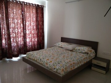 Bedroom in 4 BHK Apartment at Adani Shantigram Water Lily, Shantigram – for Rent