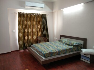 Bedroom in 4 BHK Apartment at Adani Shantigram Water Lily, Shantigram – for Rent