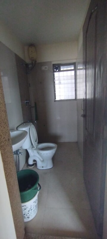 Bathroom in 1 BHK Apartment at Raunak Heights, Ghodbunder Road – for Rent