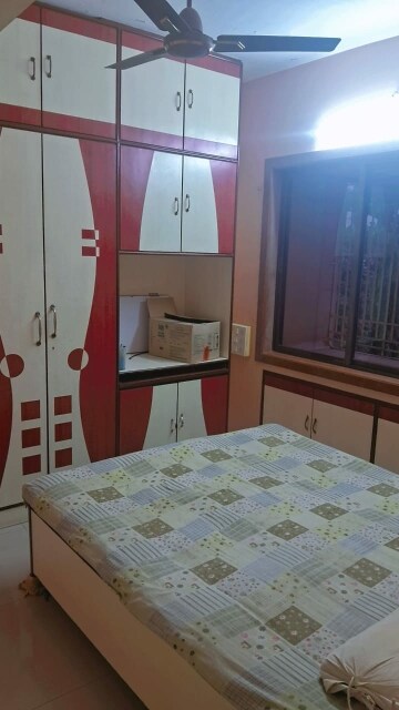 Bedroom in 2 BHK Apartment at Sai Aasha Daya CHS Ltd., Mulund East – for Rent