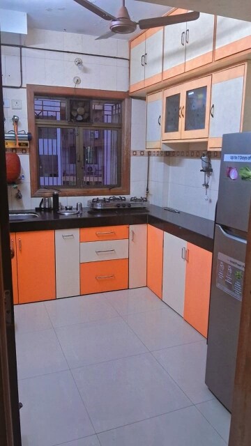 Kitchen in 2 BHK Apartment at Sai Aasha Daya CHS Ltd., Mulund East – for Rent