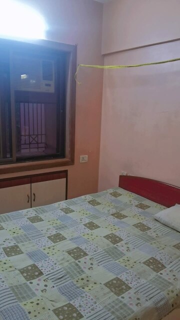 Room in 2 BHK Apartment at Sai Aasha Daya CHS Ltd., Mulund East – for Rent