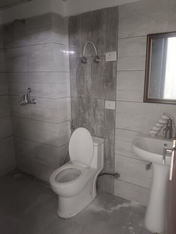 Bathroom in 3 BHK Apartment at Gulshan Bellina, Sector 16 Greater Noida – for Rent