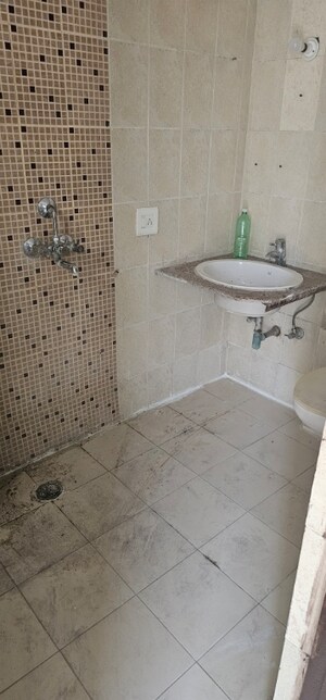Bathroom in 2 BHK Apartment at KDP Grand Savanna, Raj Nagar Extension – for Sale