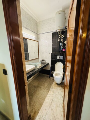 Bathroom in 4 BHK Apartment at Greater Kailash ii – for Sale