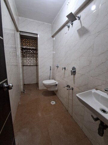 Bathroom in 1 BHK Apartment at Raunak Heights, Ghodbunder Road – for Rent