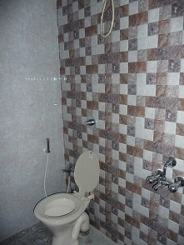 Bathroom in 2 BHK Apartment at Rustomjee Regal, Dahisar West – for Rent