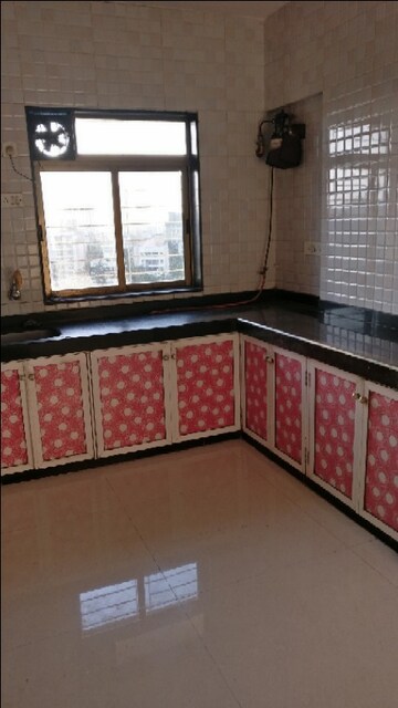 Bedroom in 2 BHK Apartment at Rustomjee Regal, Dahisar West – for Rent