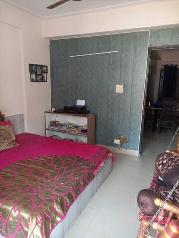 Bedroom in 2 BHK Apartment at Charms Castle, Raj Nagar Extension – for Rent