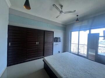 Bedroom in 2 BHK Apartment at K Raheja Heights, Malad East – for Rent