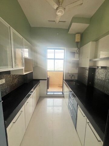 Kitchen in 2 BHK Apartment at K Raheja Heights, Malad East – for Rent