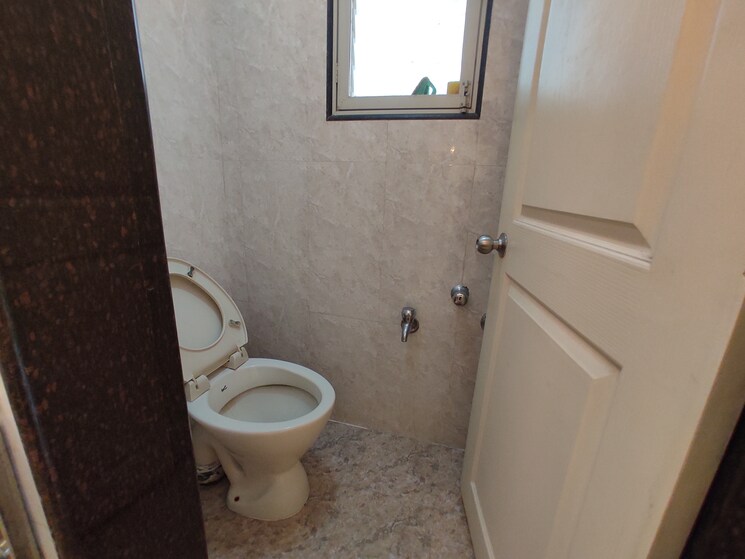 Bathroom, vasant-gulmohar-chs 2 Bedroom 1130 Sq.Ft. Apartment In Vasant Vihar Thane 8499576