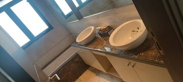 Bathroom in 4 BHK Apartment at Kailash Colony – for Sale