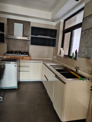 Kitchen in 4 BHK Apartment at Kailash Colony – for Sale