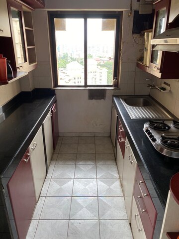 Kitchen in 2 BHK Apartment at Hiranandani Gardens Birchwood, Powai – for Rent