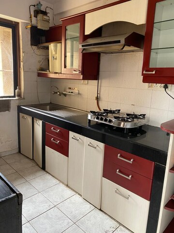 Kitchen in 2 BHK Apartment at Hiranandani Gardens Birchwood, Powai – for Rent