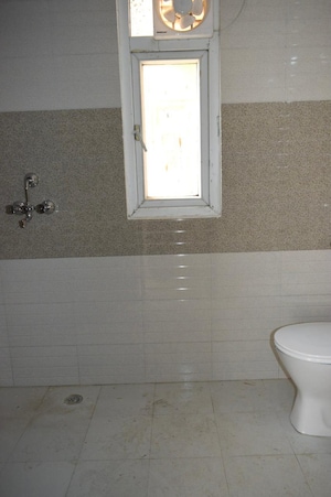 Bathroom in 2 BHK Apartment at Signature Global Orchard Avenue, Sector 93 – for Sale