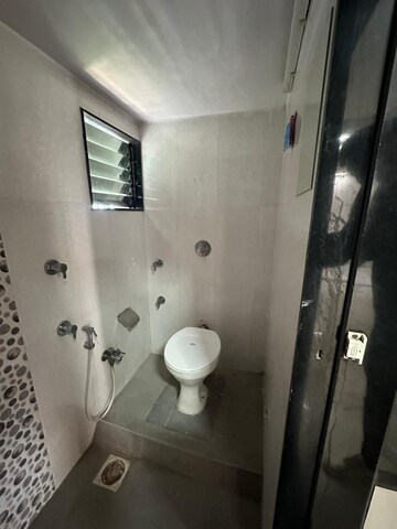 Bathroom in 2 BHK Apartment at New Mhada Towers, Andheri West – for Rent